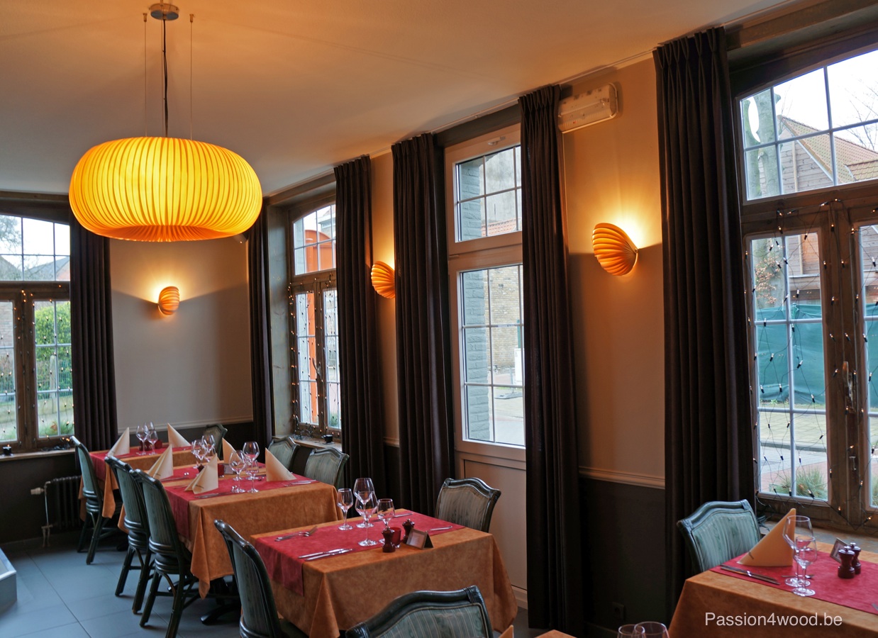 honeydip pendantlamp and nautilus wall lamps in restaurant paviljoen - rosewood and maple wood